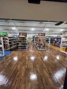 Retail store flooring after strip and seal service, clean, polished and restored by CleanKing
